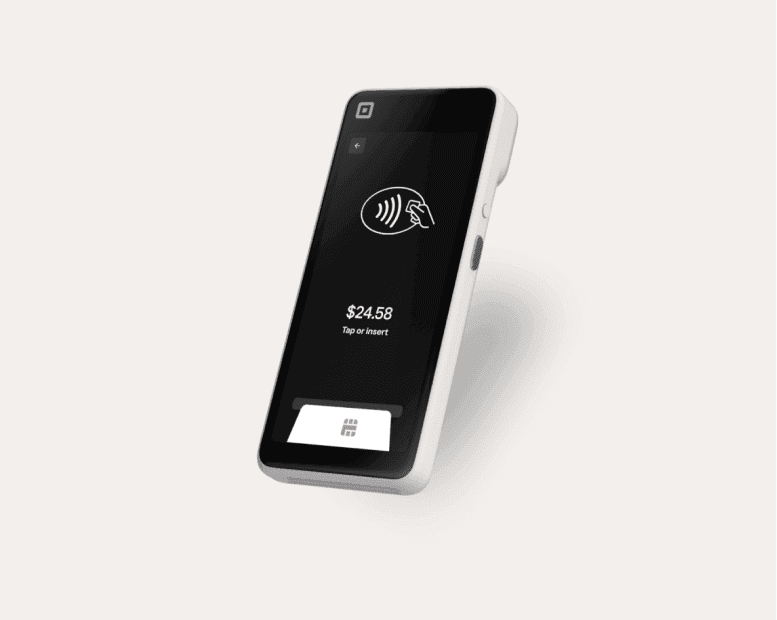 Slim mobile card terminal showing a $24.58 tap-or-insert prompt