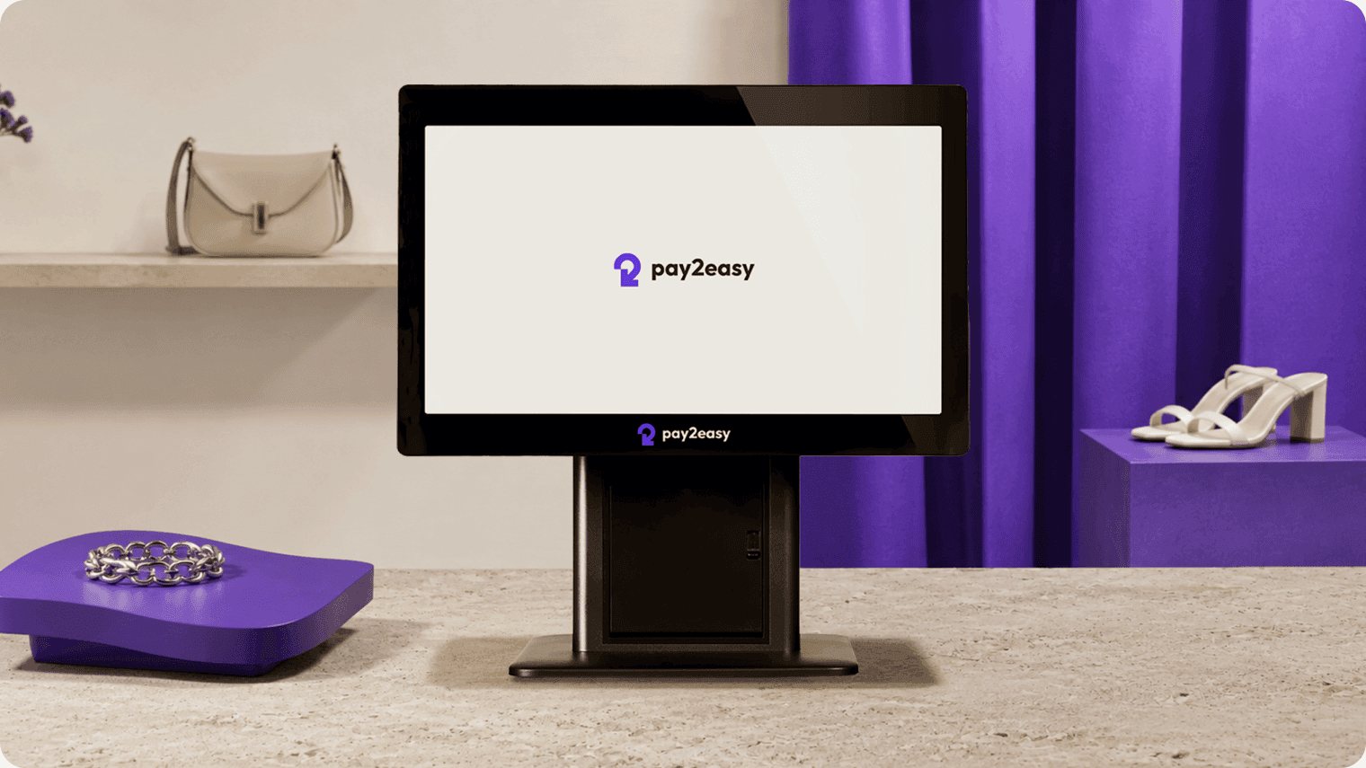 Countertop payment terminal, card reader and receipt printer on a green retail counter